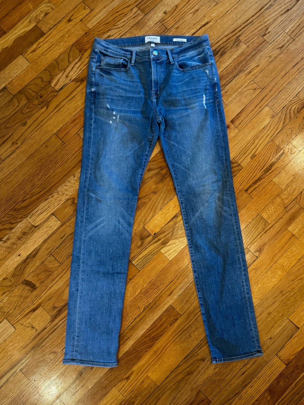 Frame Denim Men’s Jeans in Distressed Blue